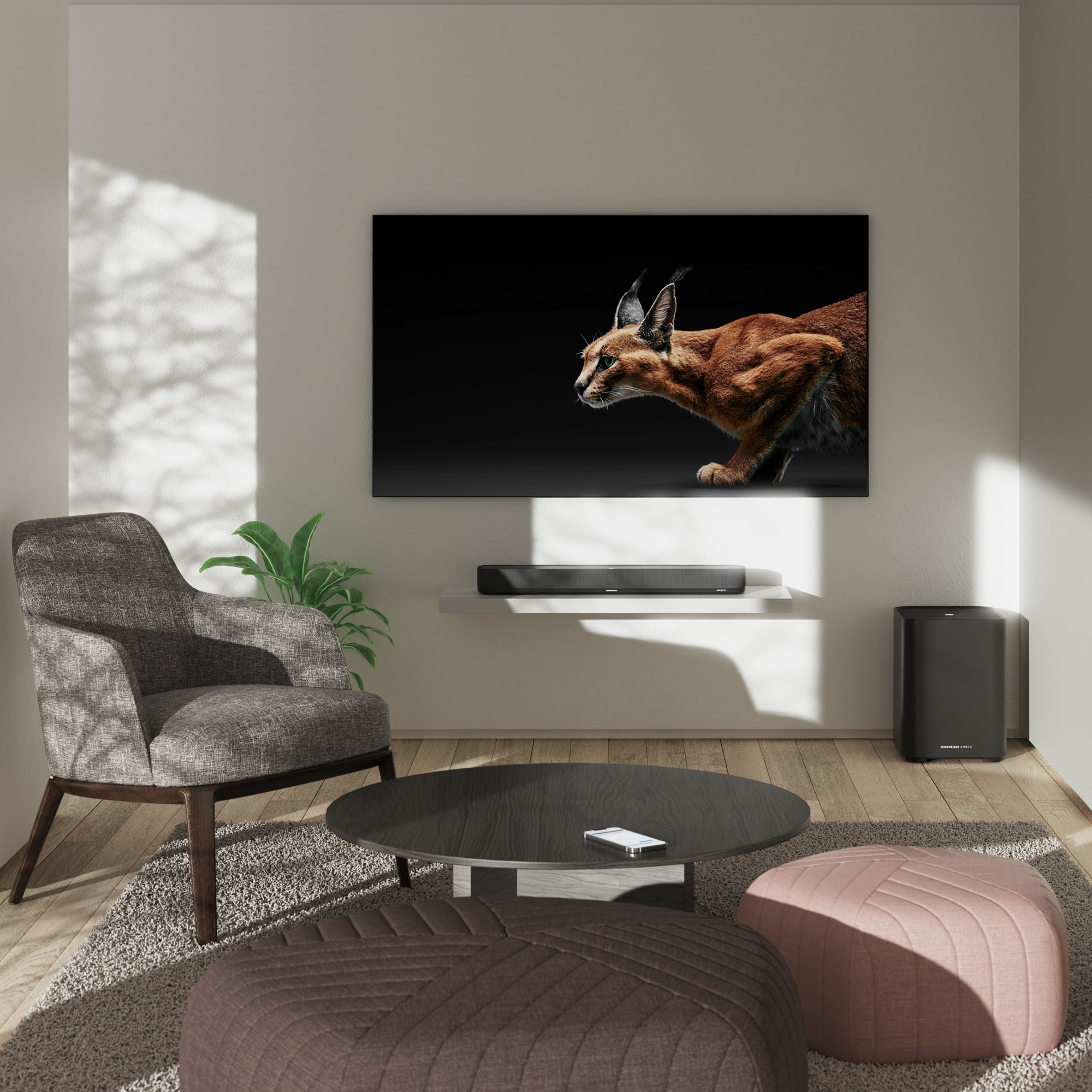 Sennheiser AMBEO Soundbar Mini Lifestyle Shot  in Living room with AMBEO Subwoofer and Modern Furniture