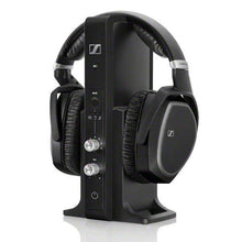 Load image into Gallery viewer, A pair of black wireless Sennheiser RS 195-U over-ear TV headphones with a charging station.