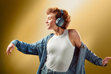 Load image into Gallery viewer, Sennheiser MOMENTUM 4 Wireless Denim Bluetooth Headphones Lifestyle Image